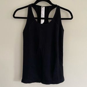 NWT black Fabletics breathable workout tank with racer back detail.